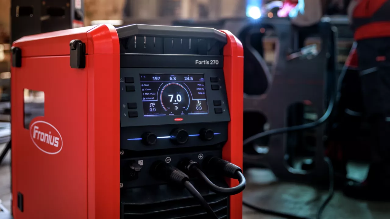 Close-up of the Fronius Fortis 270 display showing the main welding parameters